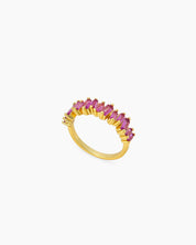 A sleek rose-red ring with perfectly aligned baguette-cut zircons that sparkle with quiet intensity