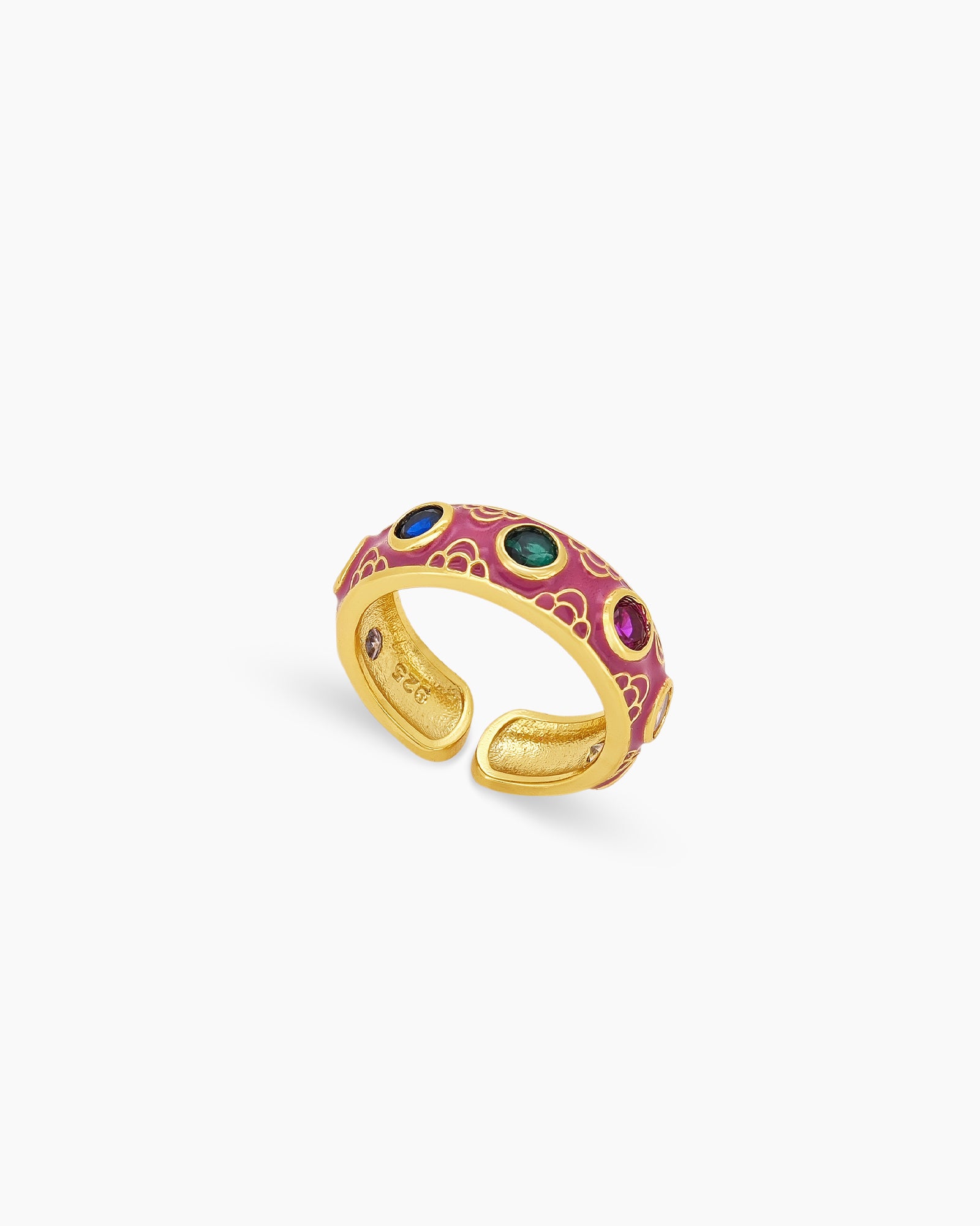 A purple ring, delicately enameled with arched motifs and dotted with bezel-set zircons for an ornate look
