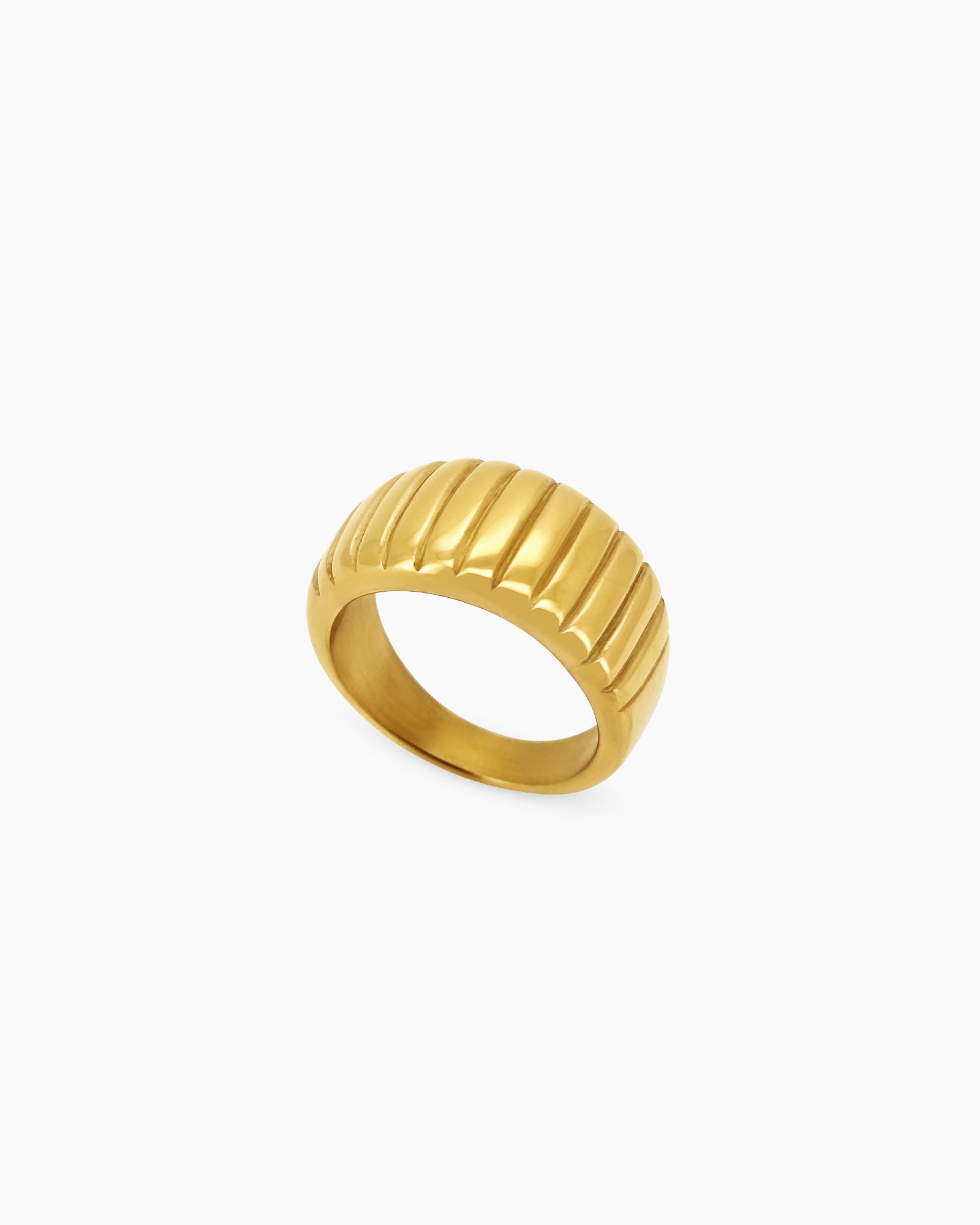 A ring with a ridged surface and gently curved dome shape, with a luminous gold finish for a balanced feel