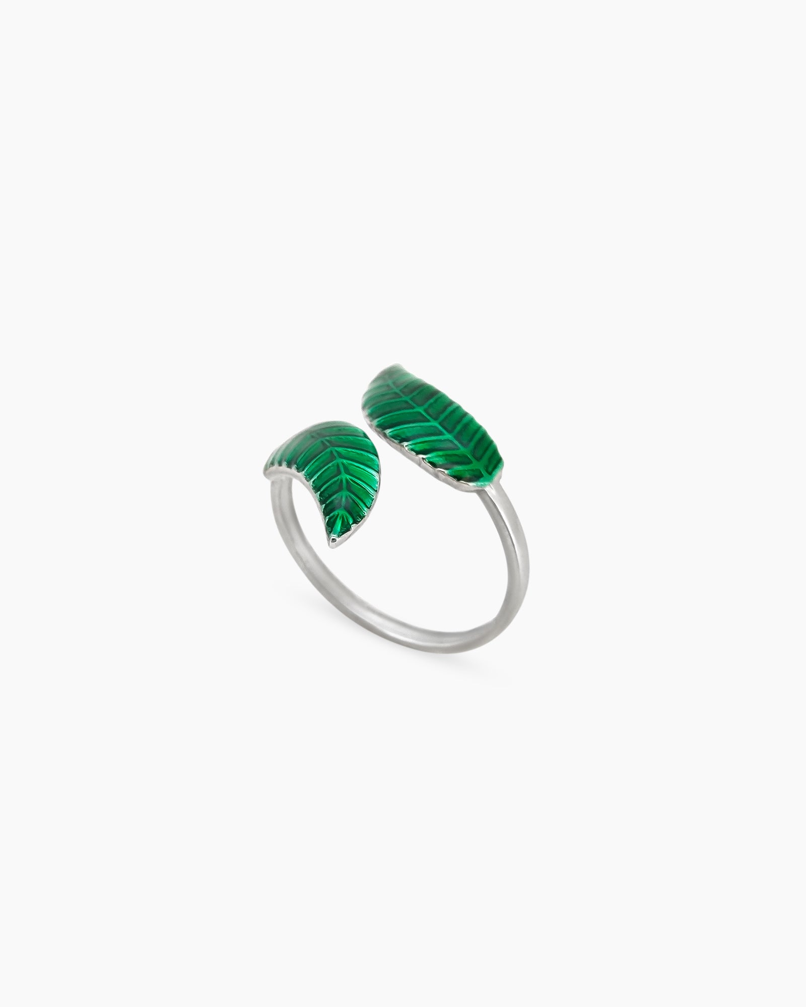 An adjustable silver-tone ring with two sculpted enamel leaves that wrap gracefully around the finger