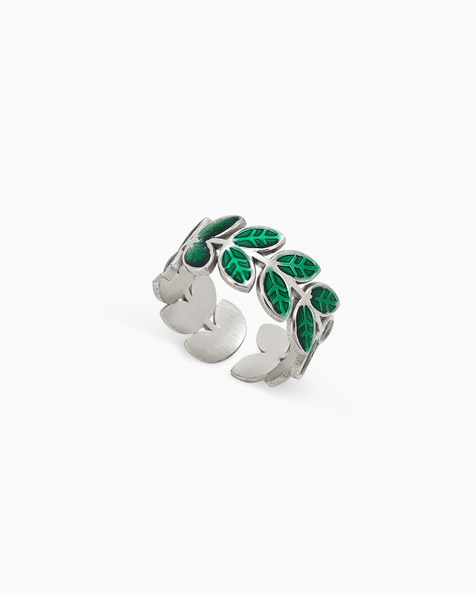 A silver-tone open band ring in a vine-like silhouette with enamel-coated green leaves