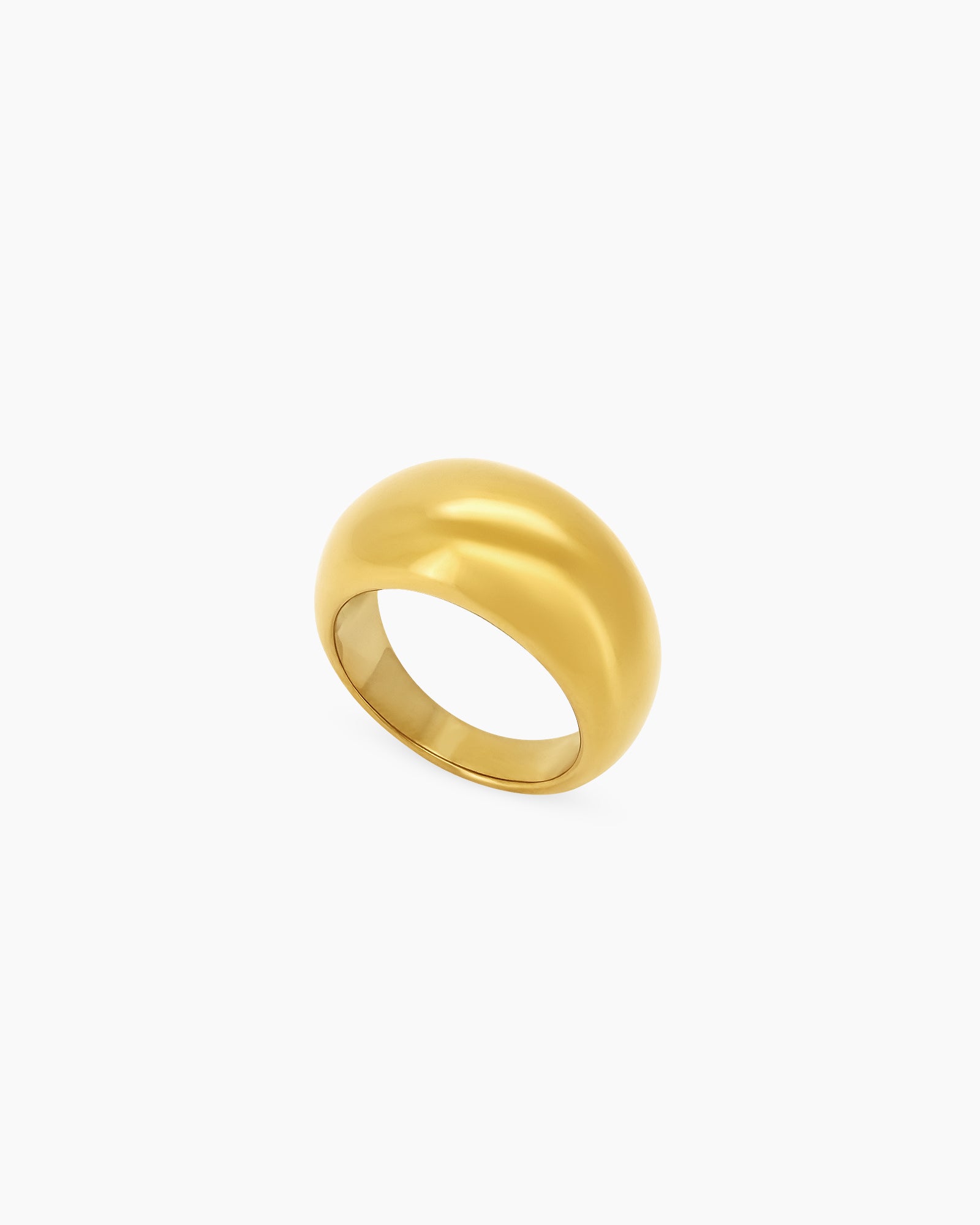 A ring with a bold dome shape and a polished gold-tone finish for a vintage-inspired, chic look