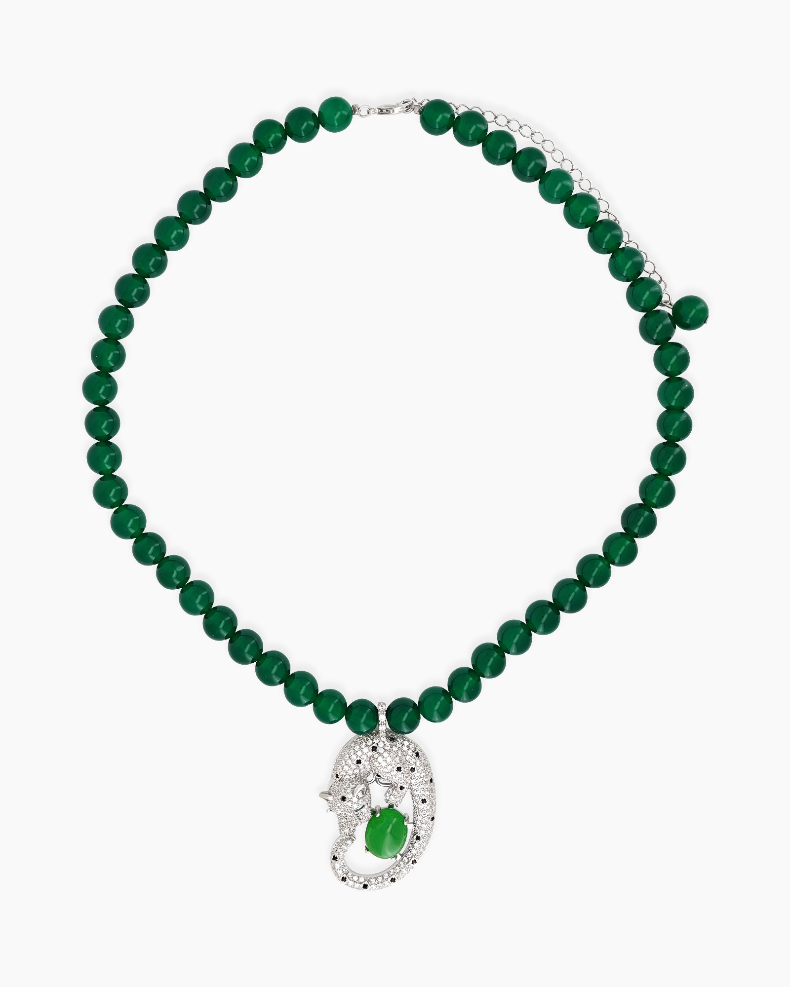 A necklace with a full strand of deep green jade beads and a striking silver-tone panther pendant