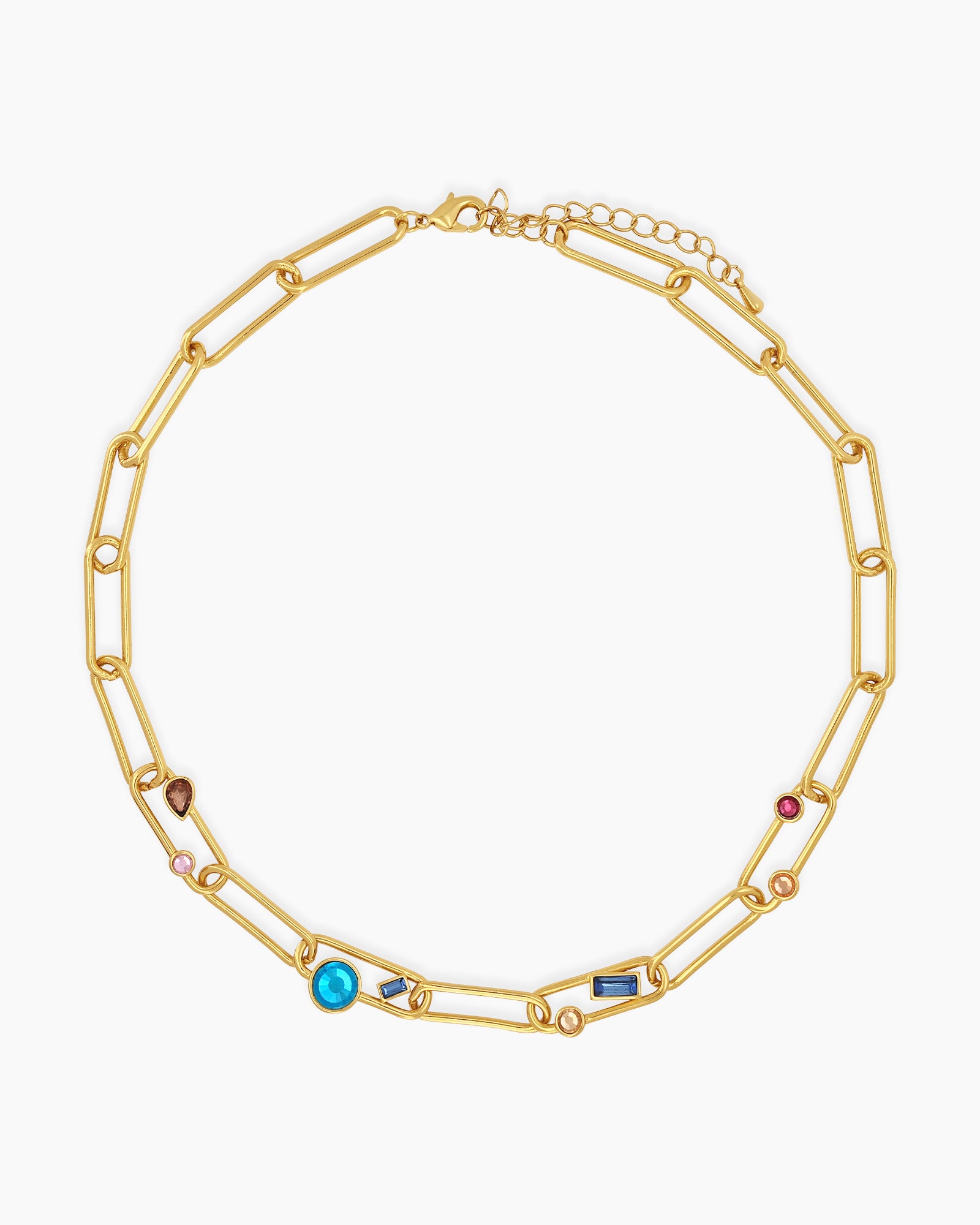 A necklace of oversized gold-tone paperclip links, adorned with an array of multicolored crystal stones