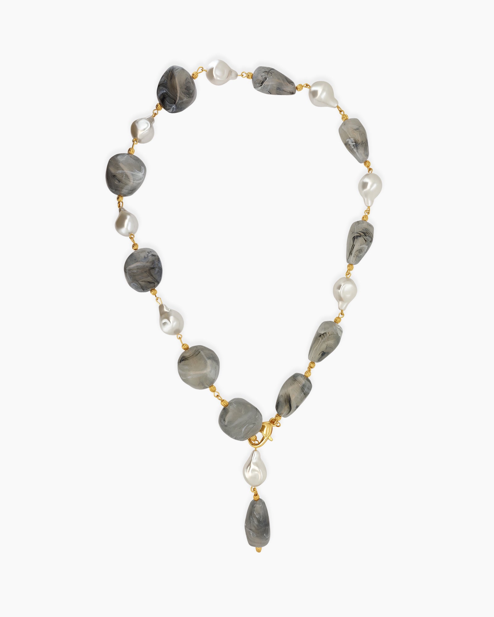 A necklace of smooth, smoky-grey resin stones accented with sculptural pearl-like beads