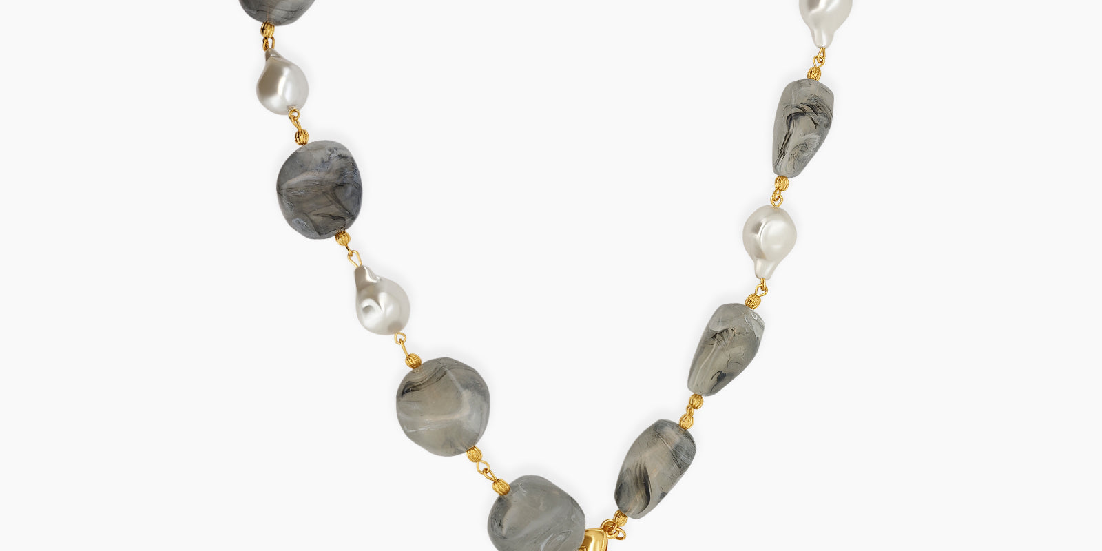 A necklace of smooth, smoky-grey resin stones accented with sculptural pearl-like beads