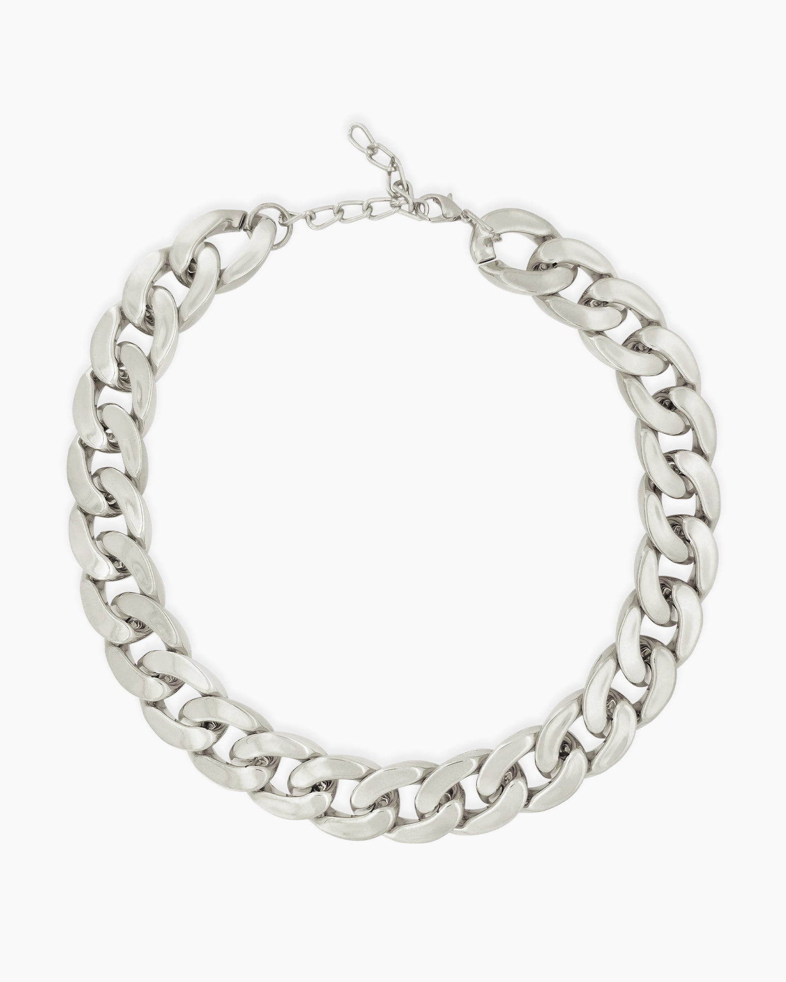 A silver necklace with a chunky silhouette and sleek polish that is both timeless and modern