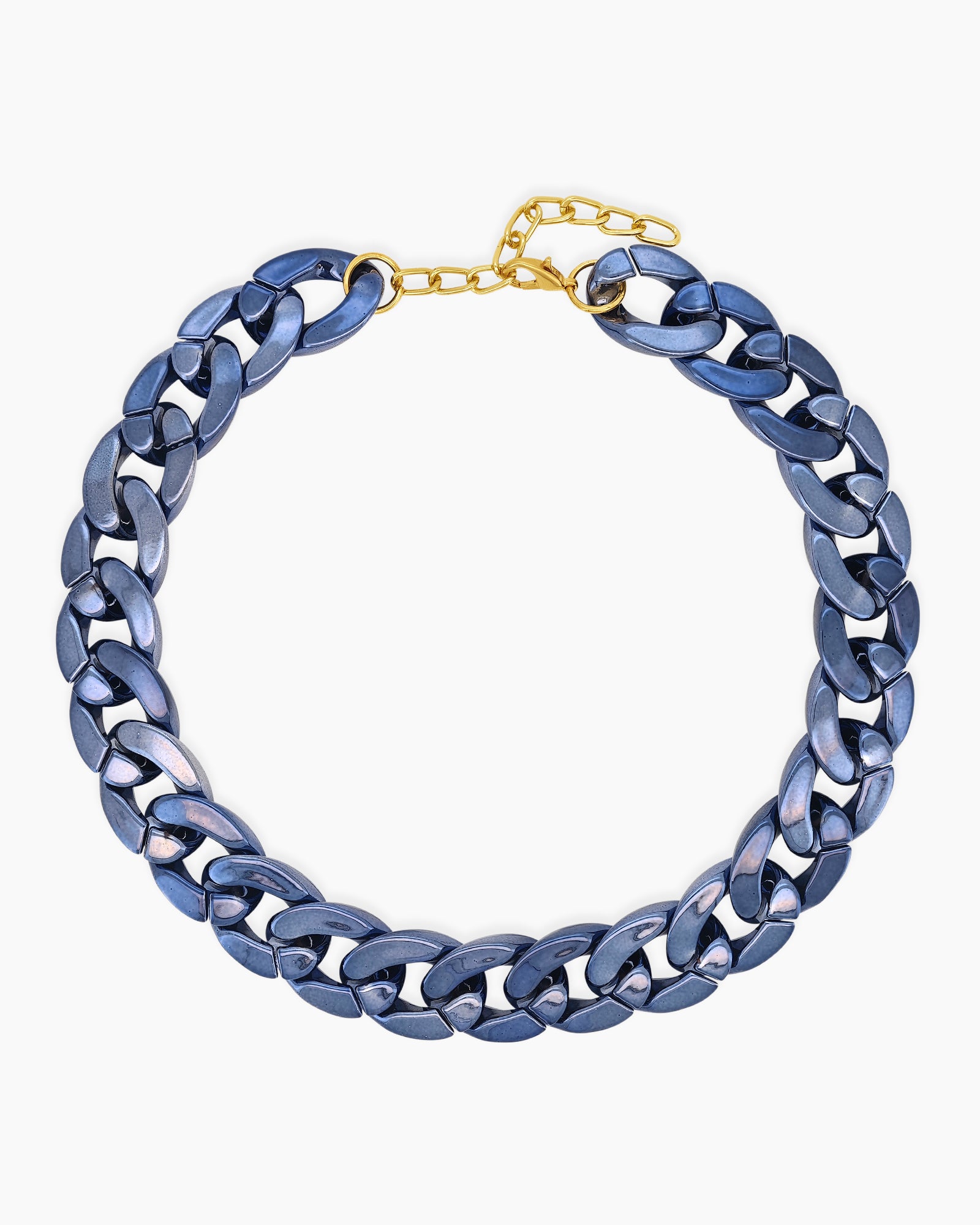 A navy necklace of oversized curb links with a high-gloss metallic finish for an expressive look