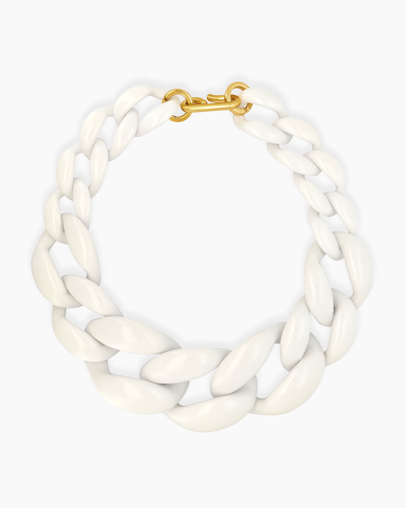 A white necklace with a dynamic progression of oversized, high-shine links for a sculptural look