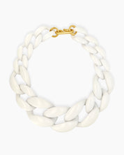 A white necklace with a dynamic progression of oversized, high-shine links for a sculptural look