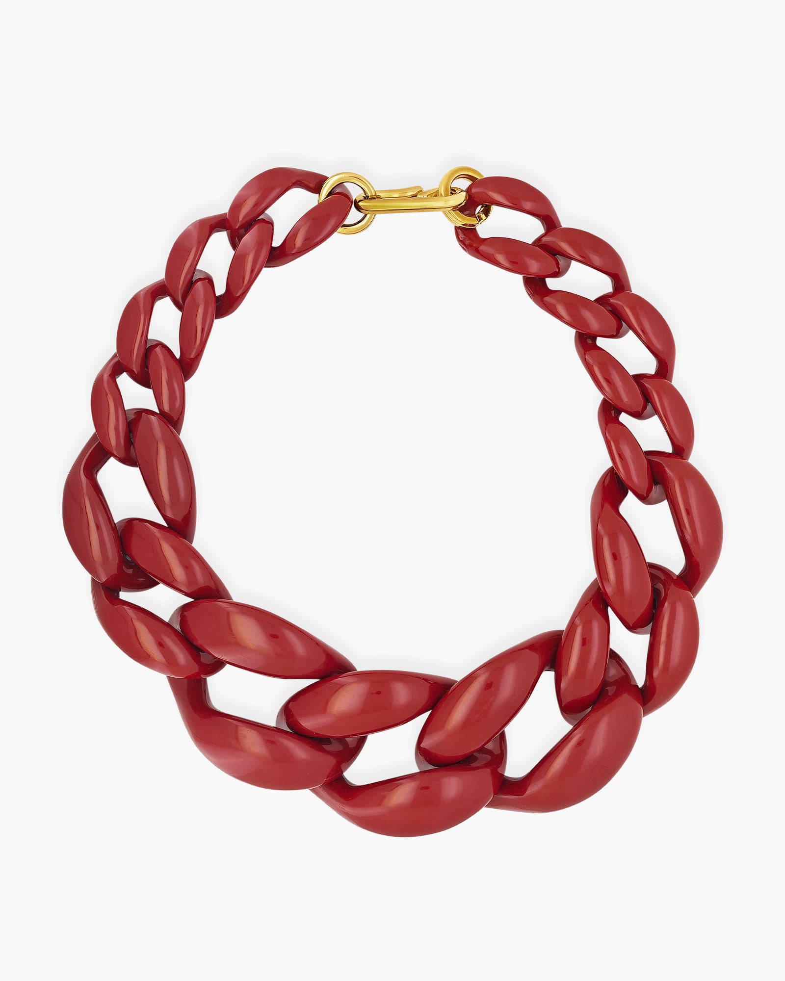 A wine-red necklace with a dynamic progression of oversized, high-shine links for a sculptural look