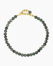 A hand-strung necklace of natural green jasper beads with soft, marbled tones for a grounded, elegant look