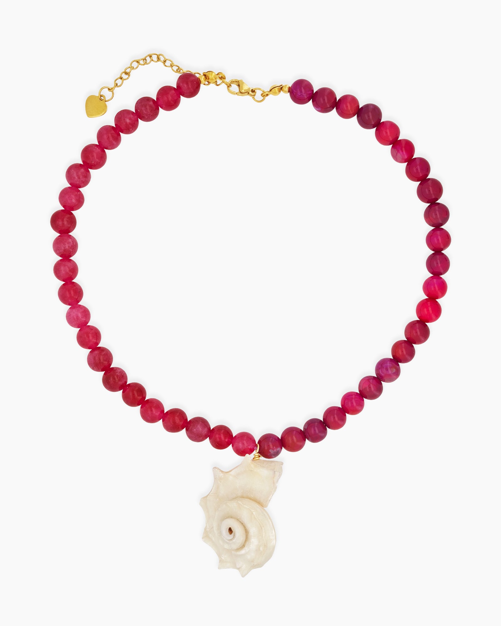 A necklace of raspberry-toned agate beads with a striking natural shell pendant at its heart