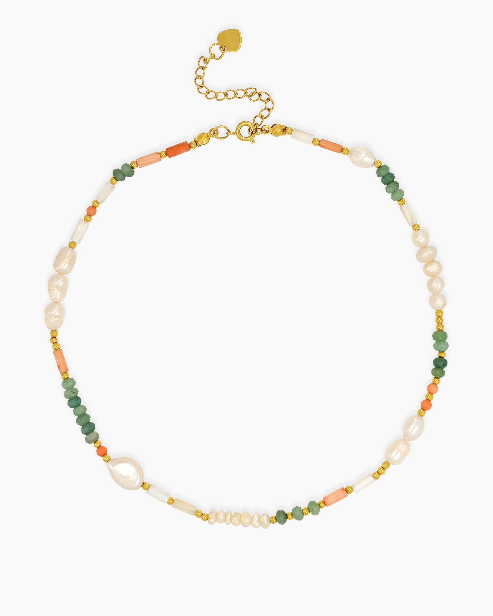 A beaded necklace with freshwater pearls, coral-hued cylinders, and sea-green faceted agate beads