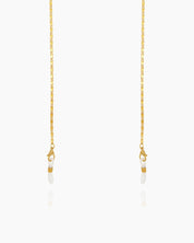 A refined gold glasses chain for eyewear, featuring a slim, gold-tone box-link design for a soft shimmer