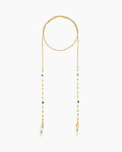 A lightweight, gold-toned glasses chain with delicate beads and subtle evil eye accents for stylish safeguarding