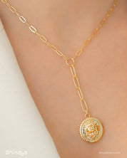 A Y-shaped necklace with a bold lion medallion and elongated paperclip chain links for a regal aesthetic