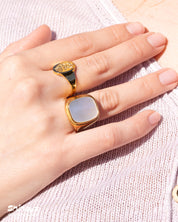 The Gaia Mother-of-Pearl Statement Ring styled with the Thalia Botanical Statement Ring