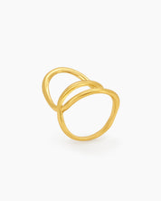 A sleek gold ring with a fluid, open curve and a high-shine finish for a modern, sculptural look