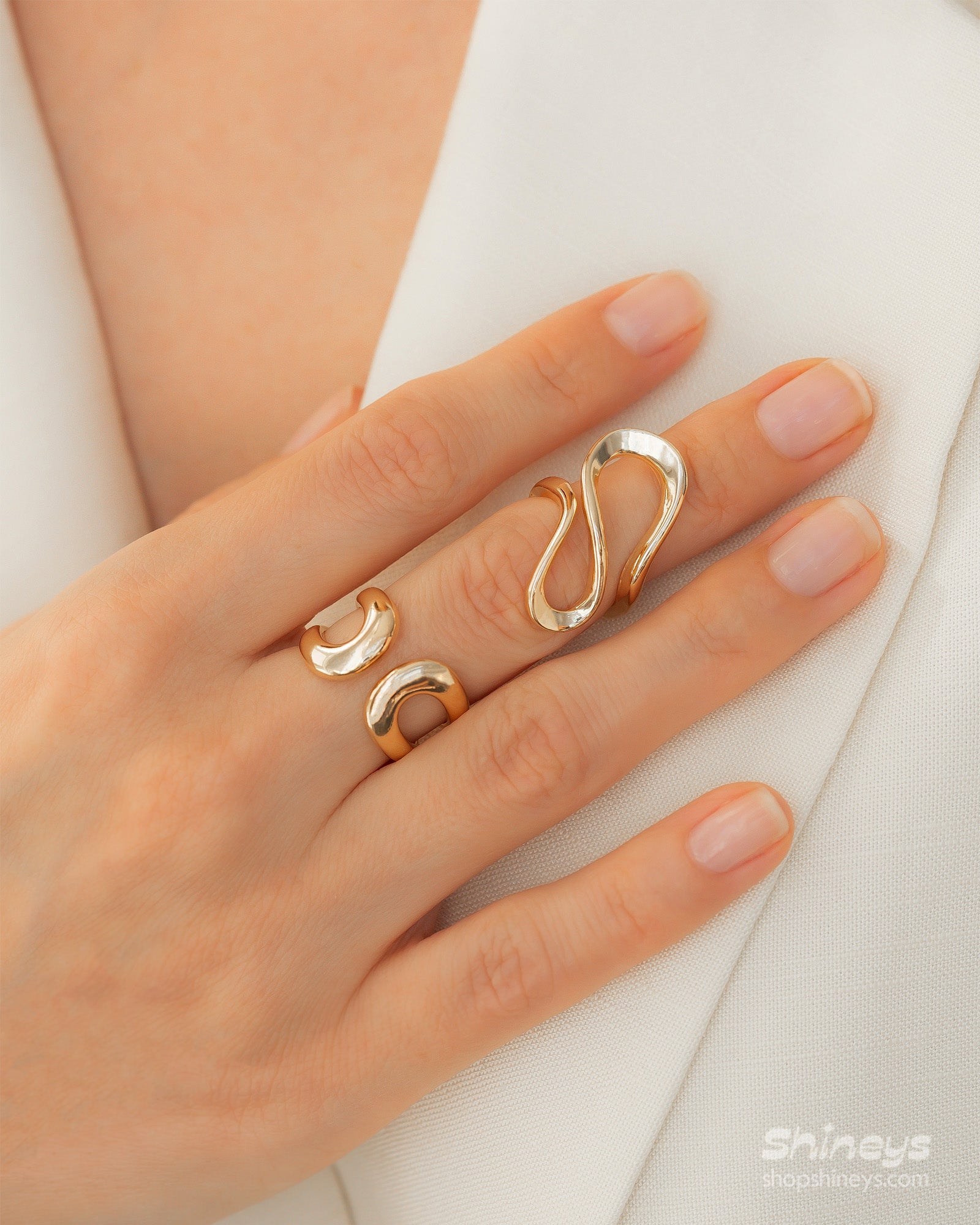 The Onda Wave Ring paired with the Jara Open Ring