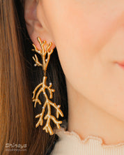 Artful statement earrings of hammered gold coral branches adorned with scattered faux pearls