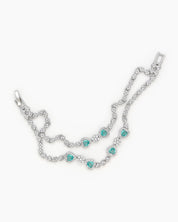 A radiant lake-blue vintage-style bracelet with two rows of zircons and five haloed heart-shaped centerpieces