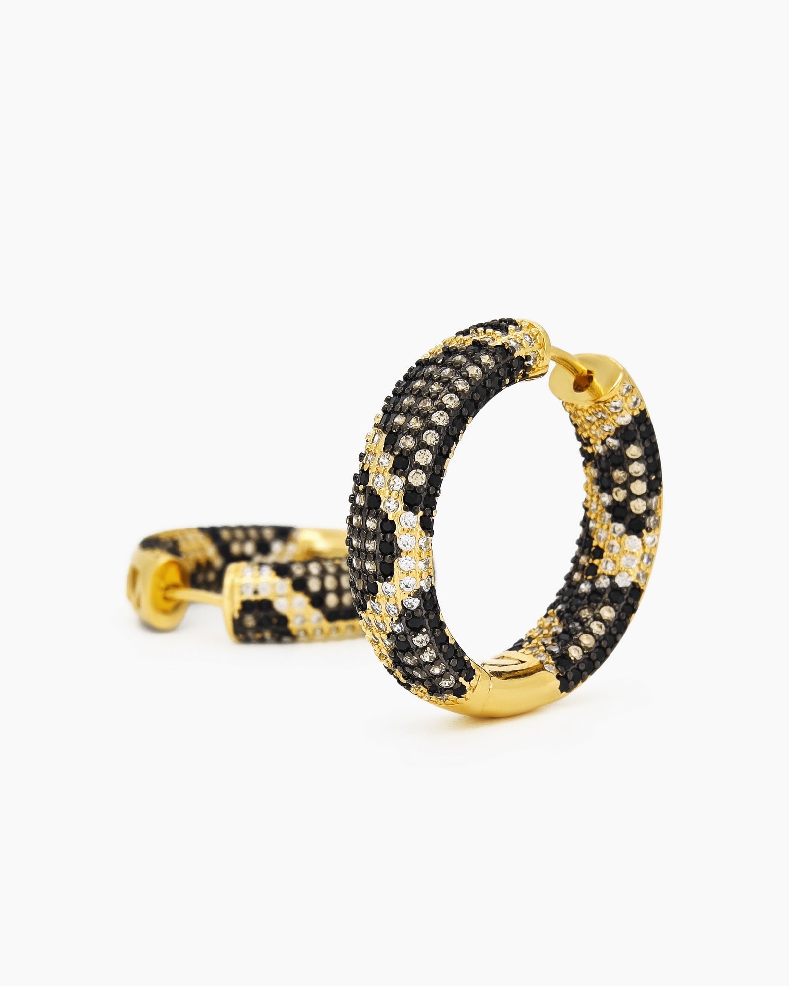 Gold-tone chunky hoops with a striking leopard-print pattern crafted from pavé-set zircons