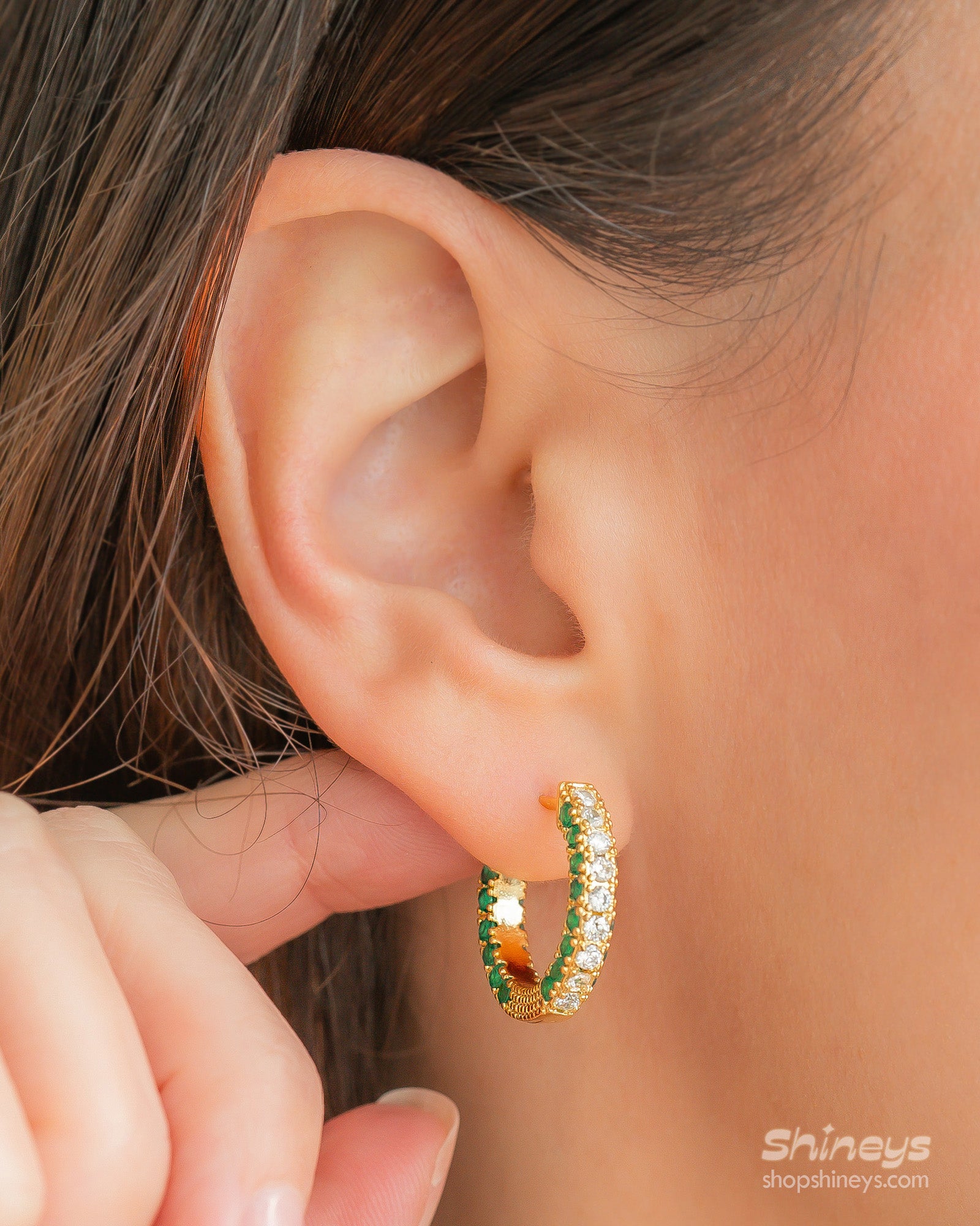 Chunky gold-green hoops with two radiant rows of pavé-set zircons for dazzling, daily glam