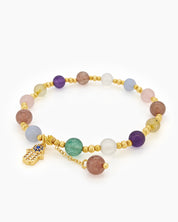 A stretch-fit bracelet with a radiant mix of multicolored crystal beads and a delicate Hamsa charm