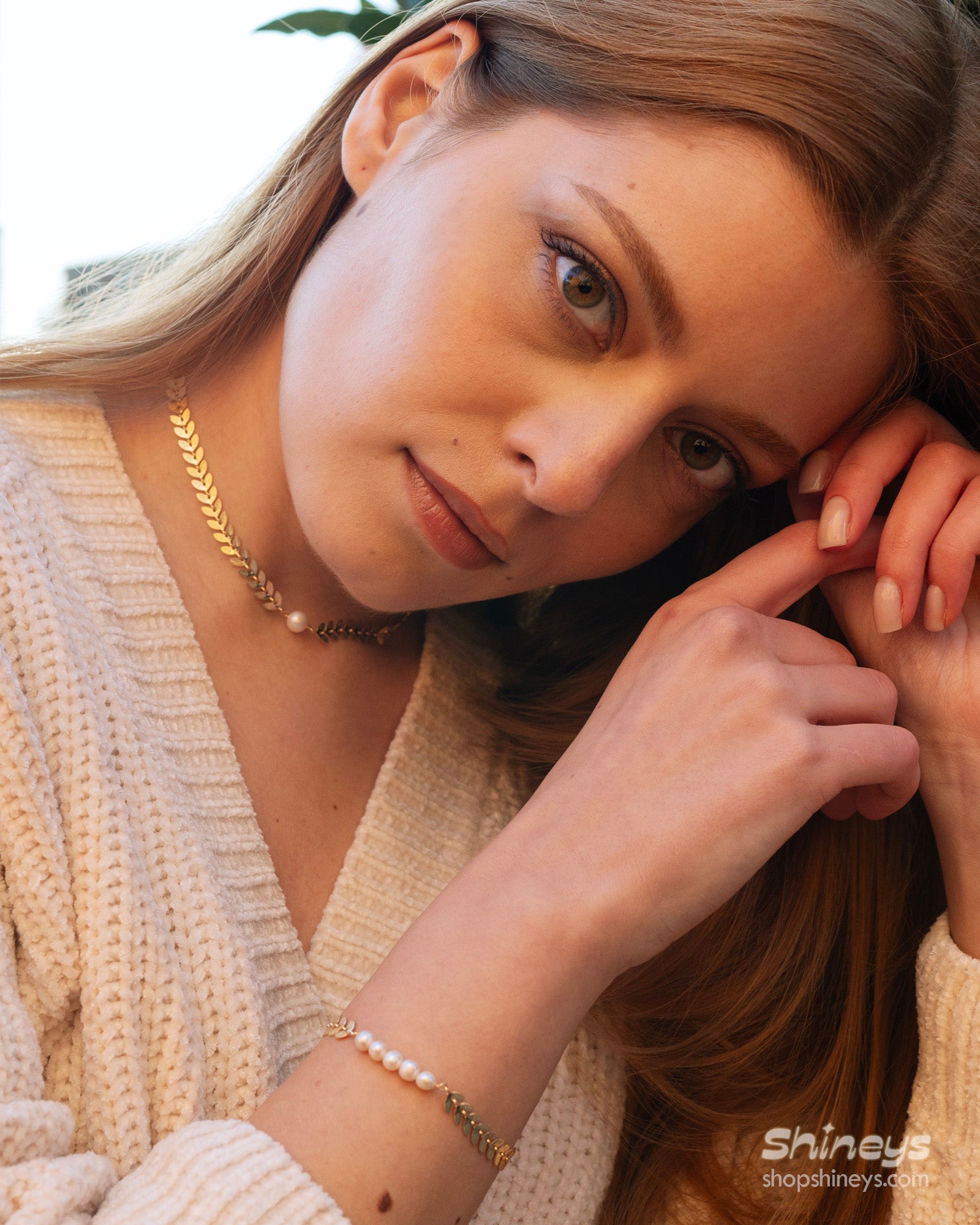 The Helena Laurel Motif Pearl Choker paired with the matching Bracelet