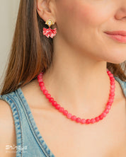The Searose Drop Earrings styled with the Melissa Red Stone Necklace