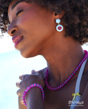 The Marnie Pink Beaded Necklace and Bracelet, shown with the Laguna Statement Earrings