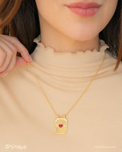 A keepsake-style necklace with a sculpted Black Mushroom pendant and sunbeam detailing on a twisted chain