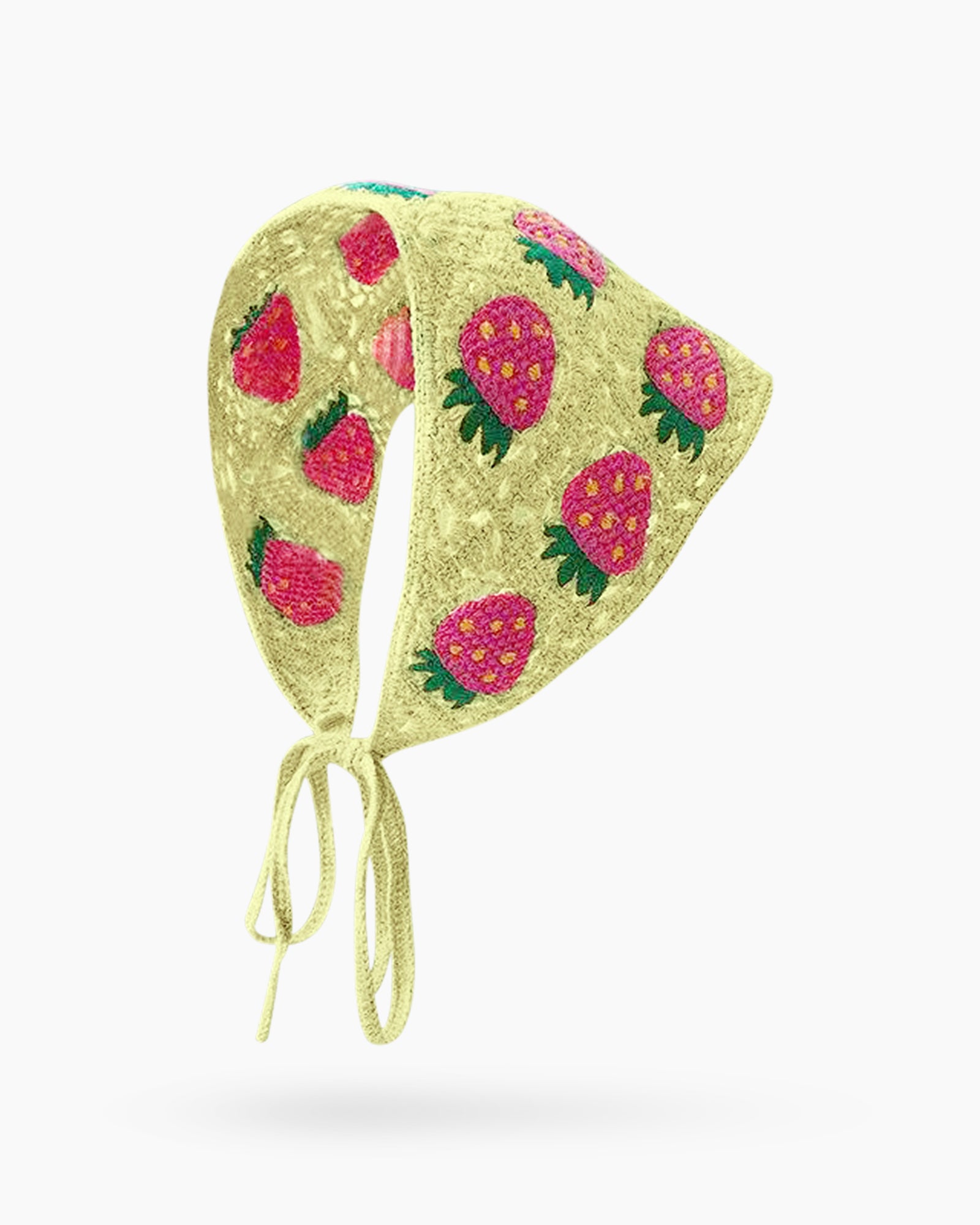 A hand-crocheted headscarf in light-purple with adorable strawberry motifs for a sweet, whimsical look