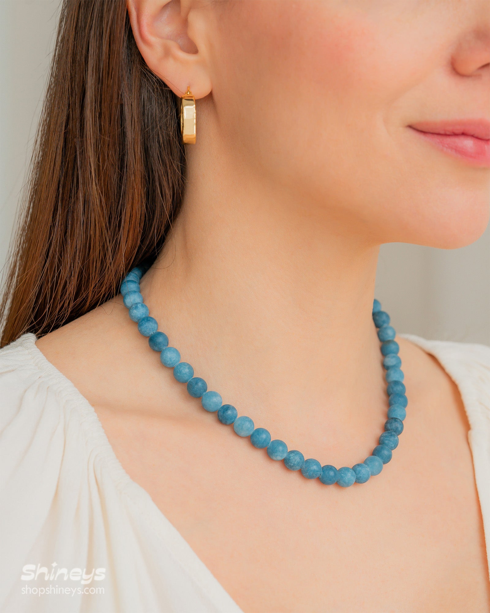 The Chelsea Blue Stone Necklace paired with the Carol Bold Hoops